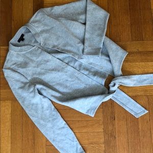 Unique Jcrew sweater with tie bottom and snap up